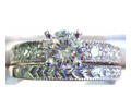 1.31 Ct. tw Diamond Engagement Ring
.50 Ct tw Wedding Band