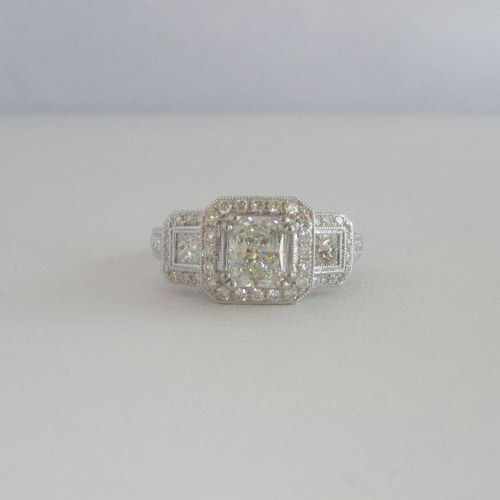 18 K White Gold 1.09 center Radiant diamond certified GIA  F VS 2  plus 1.15 diamonds