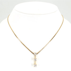 Estate Jewelry:14 K Yellow Gold Necklace with Three Round Diamonds