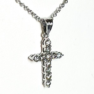 14 Karat White Gold Necklace Set With One 3/4 of An Inch Long Cross