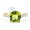 Gold ring with cushion shaped green peridot