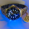 Actual watch illuminated by black light
