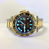 Picture of the actual GMT Master 116713 illuminated with black light